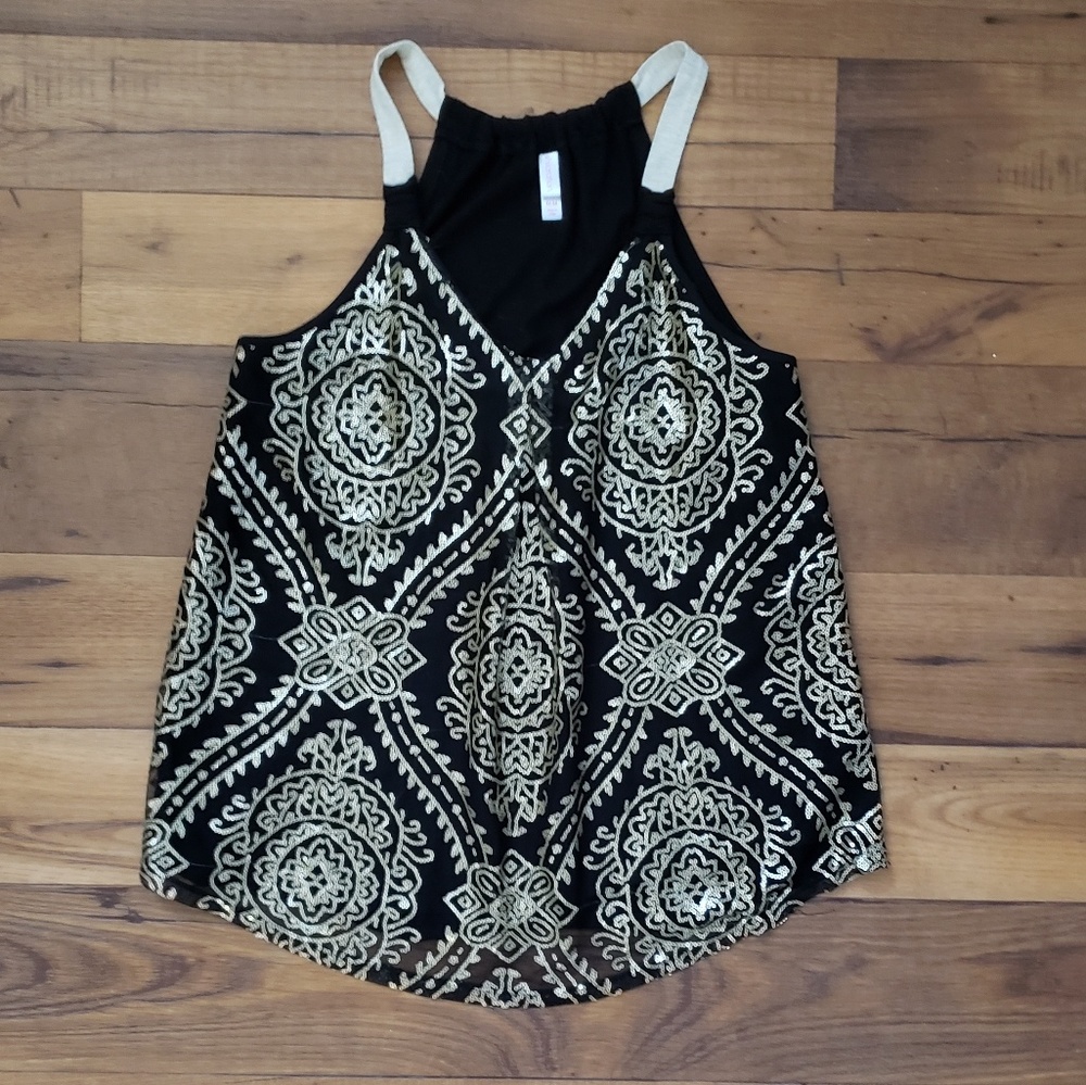 Sleeveless gold sequins shirt